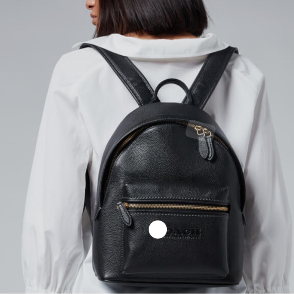 Gently used coach charter backpack 18. Tag missing.